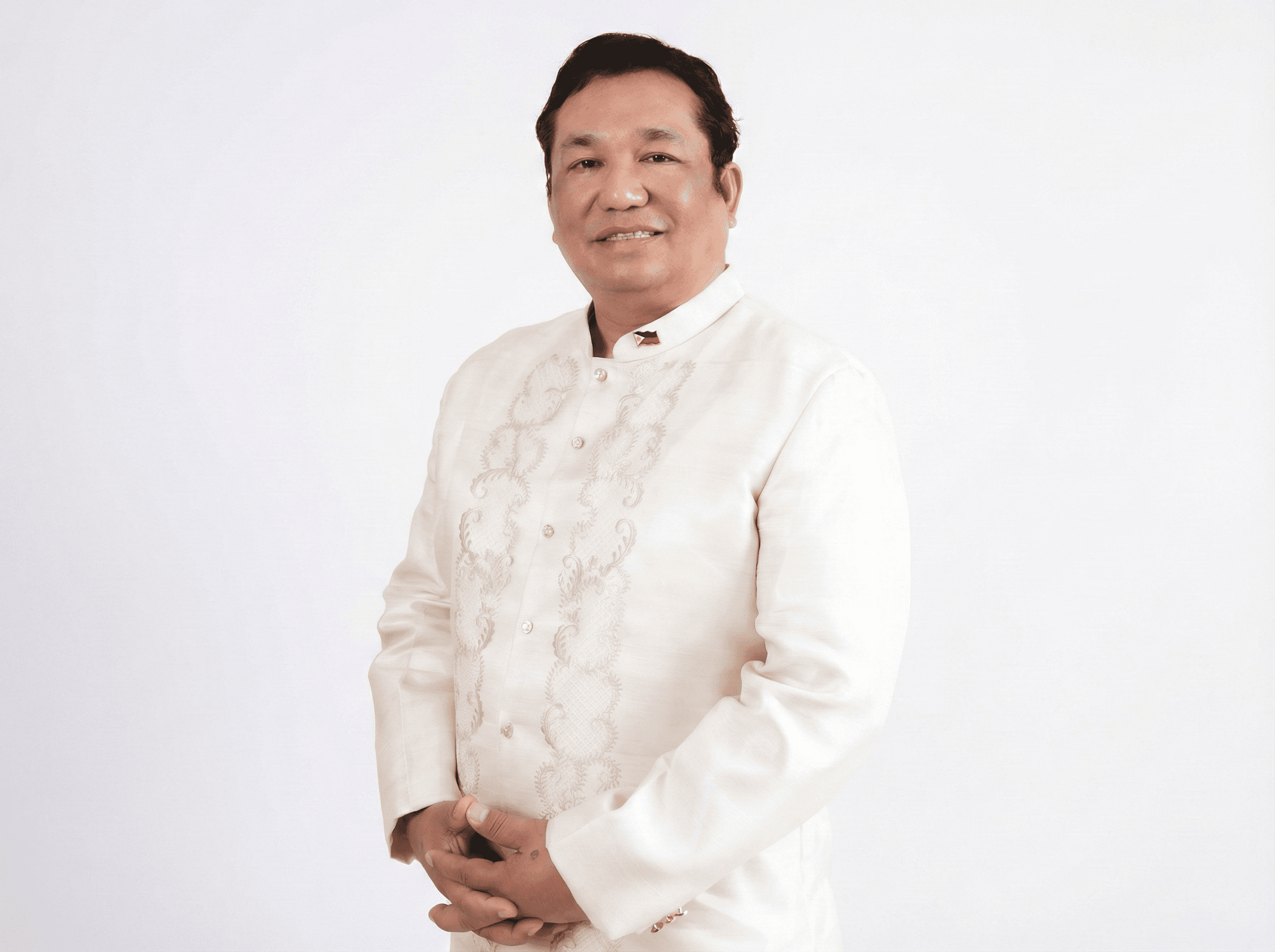 Commissioner Albert Dela Cruz
